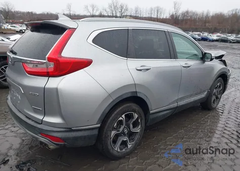 2019 Honda Cr-V Touring z USA, uszkodzony, nr VIN JHLRW2H92KX007825